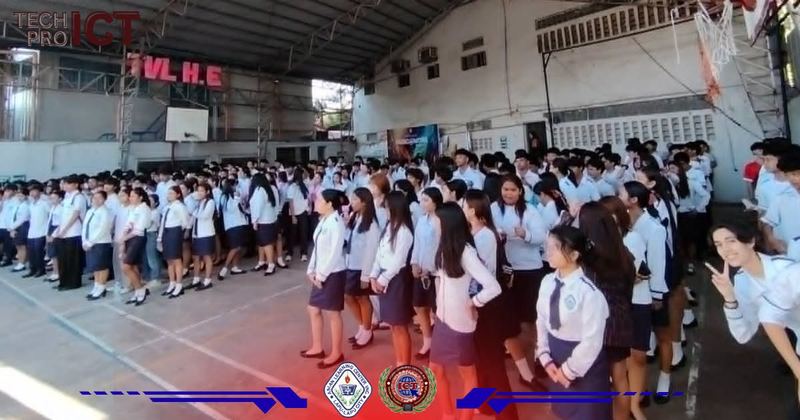 Students assembled on campus grounds during a school program